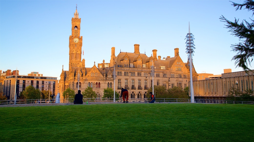 Bradford City Hall featuring a sunset, a park and heritage architecture