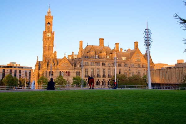 Bradford City Hall featuring a sunset, a park and heritage architecture