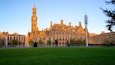 Bradford City Hall featuring a sunset, a park and heritage architecture