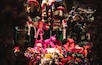 A variety of colorful stuffed animals and toys displayed in a shop.