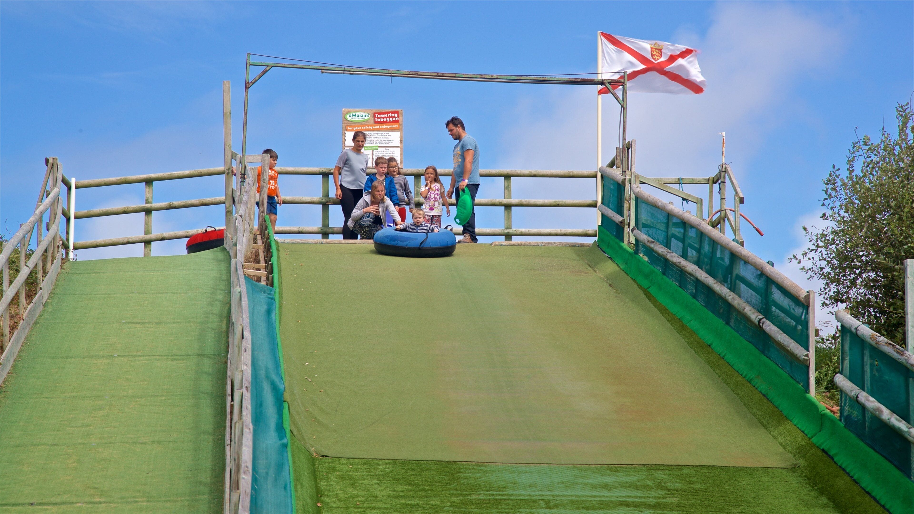 aMazin! Adventure Park & Maze showing a waterpark as well as a family