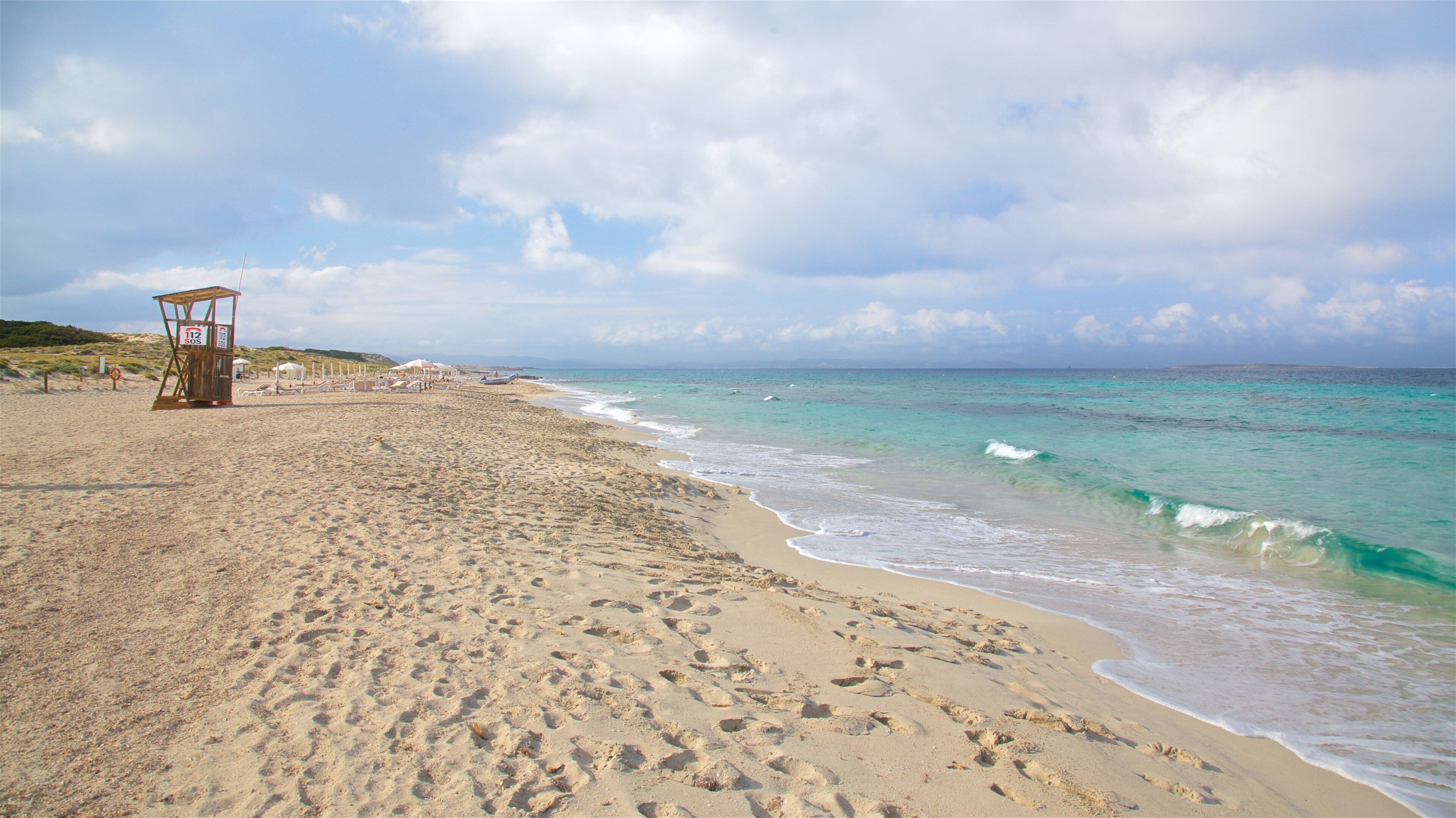 Llevant Beach featuring a sandy beach and general coastal views