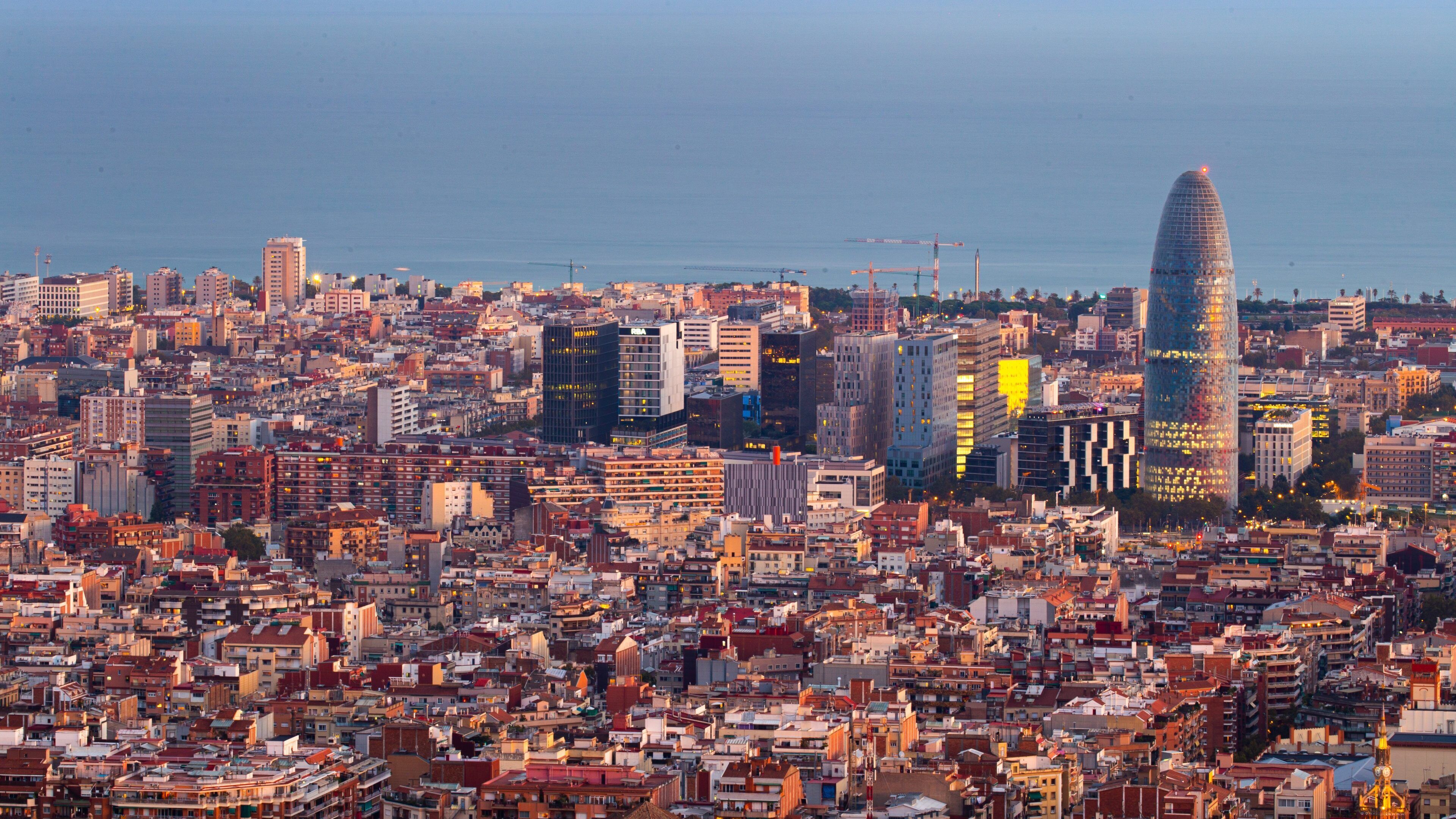 Turo de la Rovira showing landscape views, a city and a coastal town
