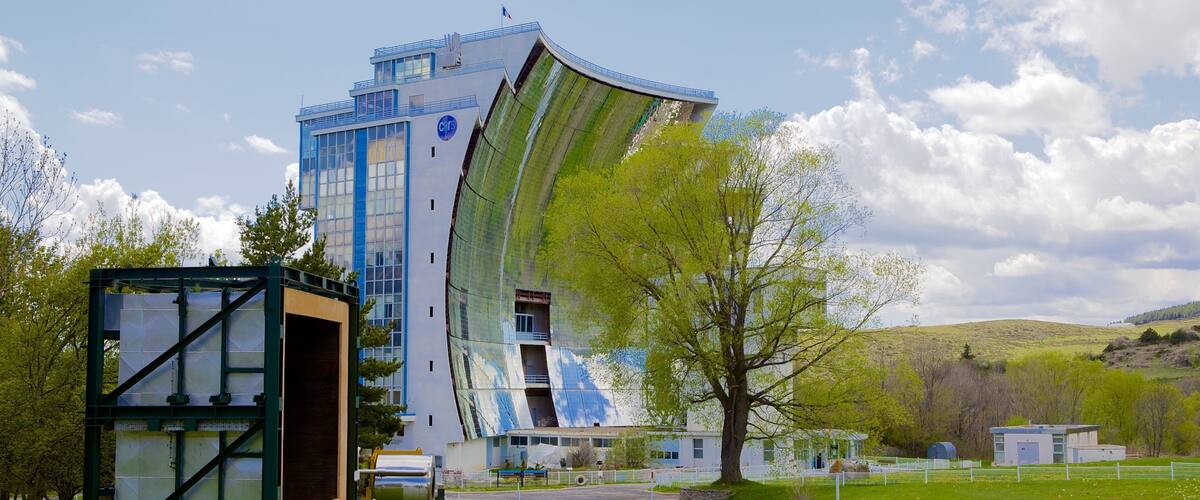 Heliodyssee-Grand Four Solaire d\'Odeillo featuring modern architecture and a garden