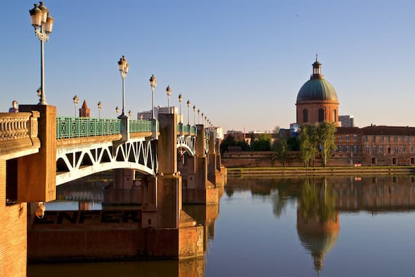 Garonne mettant en vedette riviĂšre ou ruisseau, pont et coucher de soleil