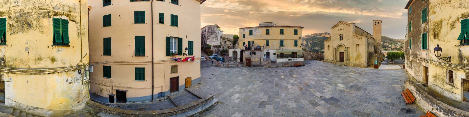Beautiful panoramic view of Colletta square and San Michele Arcangelo church in the medieval old town of Ventimiglia in Italy, Liguria, Italy. Ligurian Riviera, province of Imperia