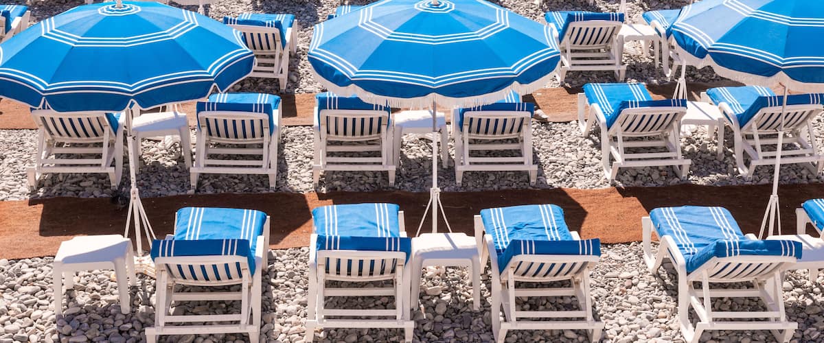 Blue beach umbrellas in Nice