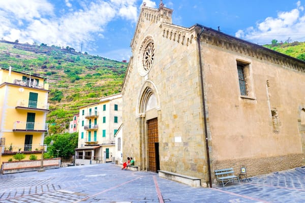 Manarola town, Riomaggiore, La Spezia province, Liguria, northern Italy. The San Lorenzo church facade, monument landmark. Part of the Cinque Terre National Park and a UNESCO World Heritage Site.
