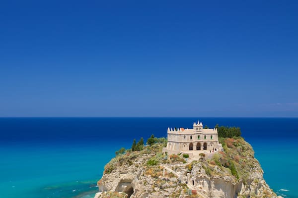 Santa Maria dell\'Isola Monastery which includes landscape views, a castle and general coastal views