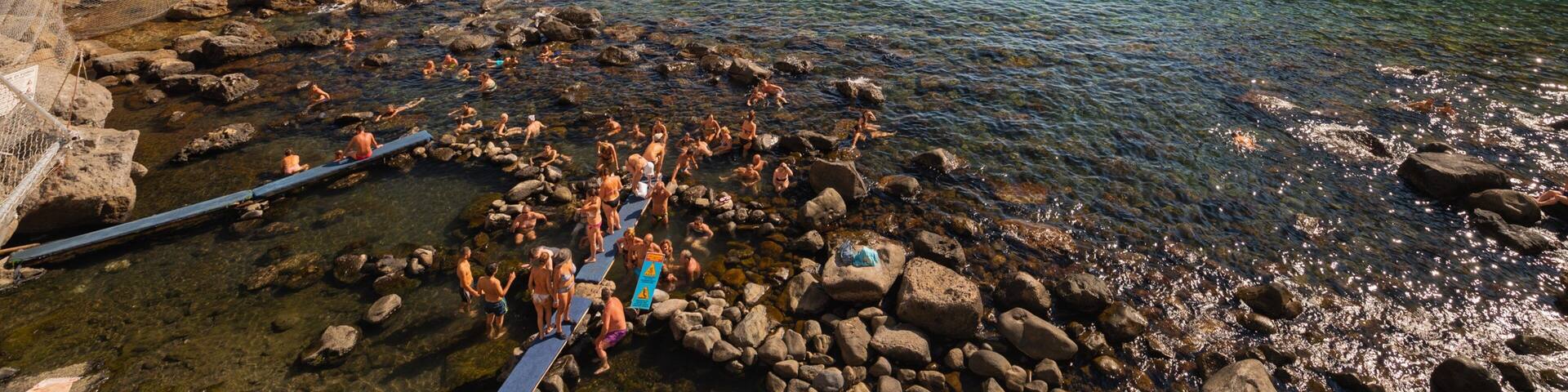 Bay of Sorgeto featuring general coastal views and rocky coastline