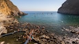 Bay of Sorgeto featuring general coastal views and rocky coastline