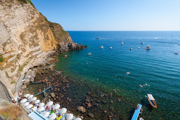 Bay of Sorgeto which includes general coastal views, rugged coastline and landscape views