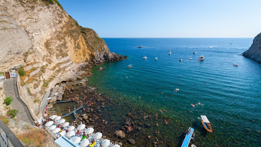 Bay of Sorgeto which includes general coastal views, rugged coastline and landscape views