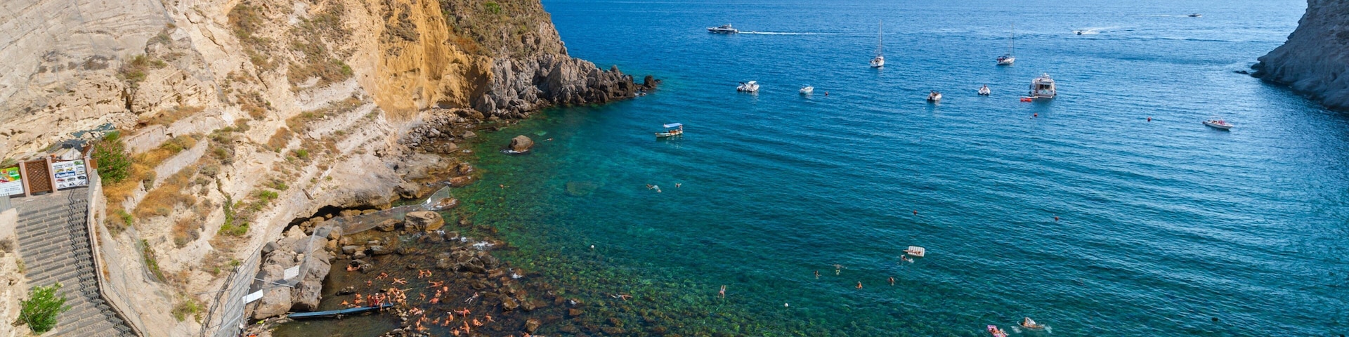 Bay of Sorgeto which includes general coastal views, rugged coastline and landscape views
