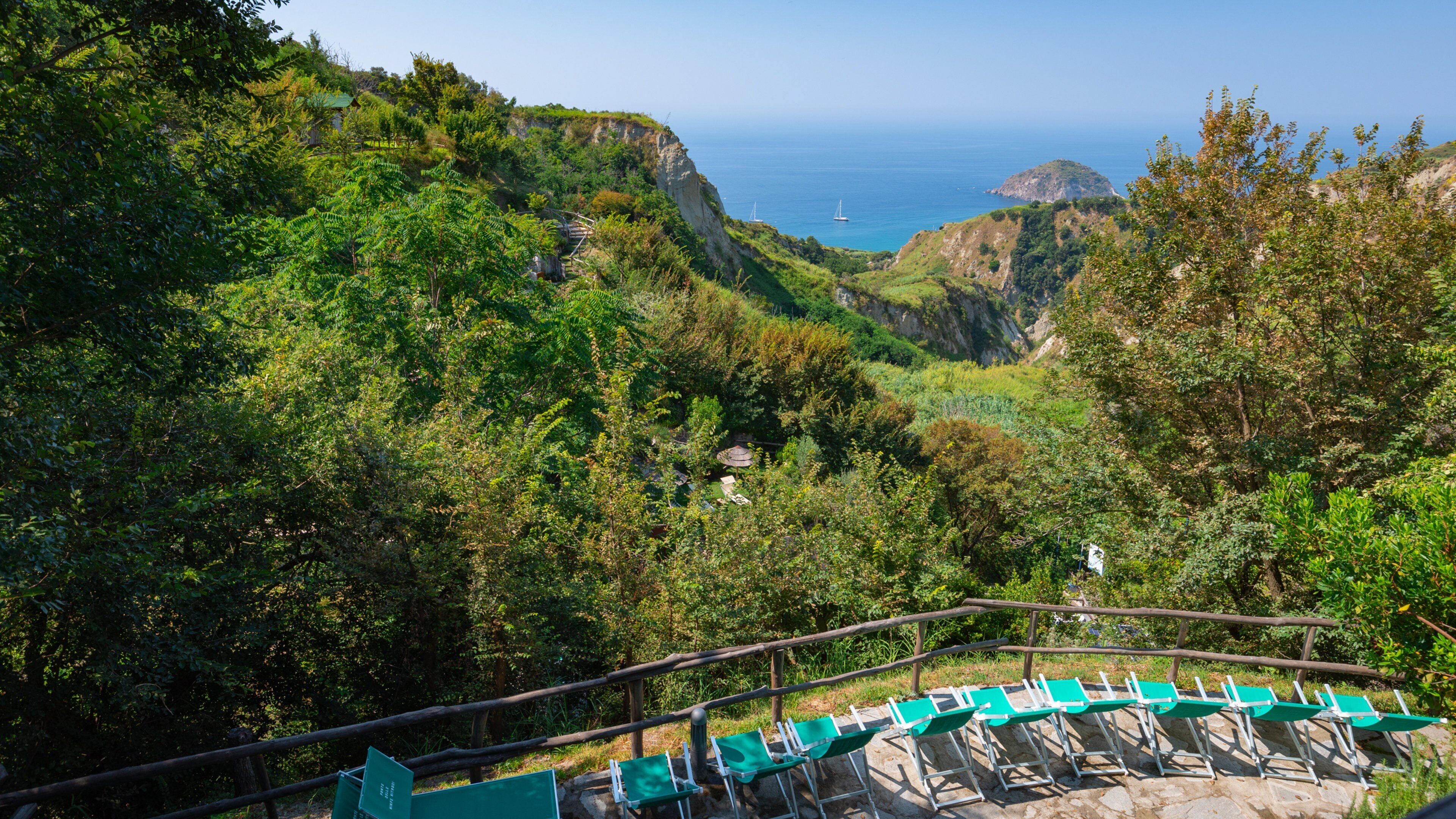 Nitrodi Hot Springs featuring rocky coastline and general coastal views