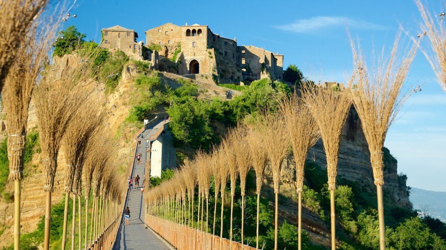Bagnoregio featuring a sunset, a castle and a bridge
