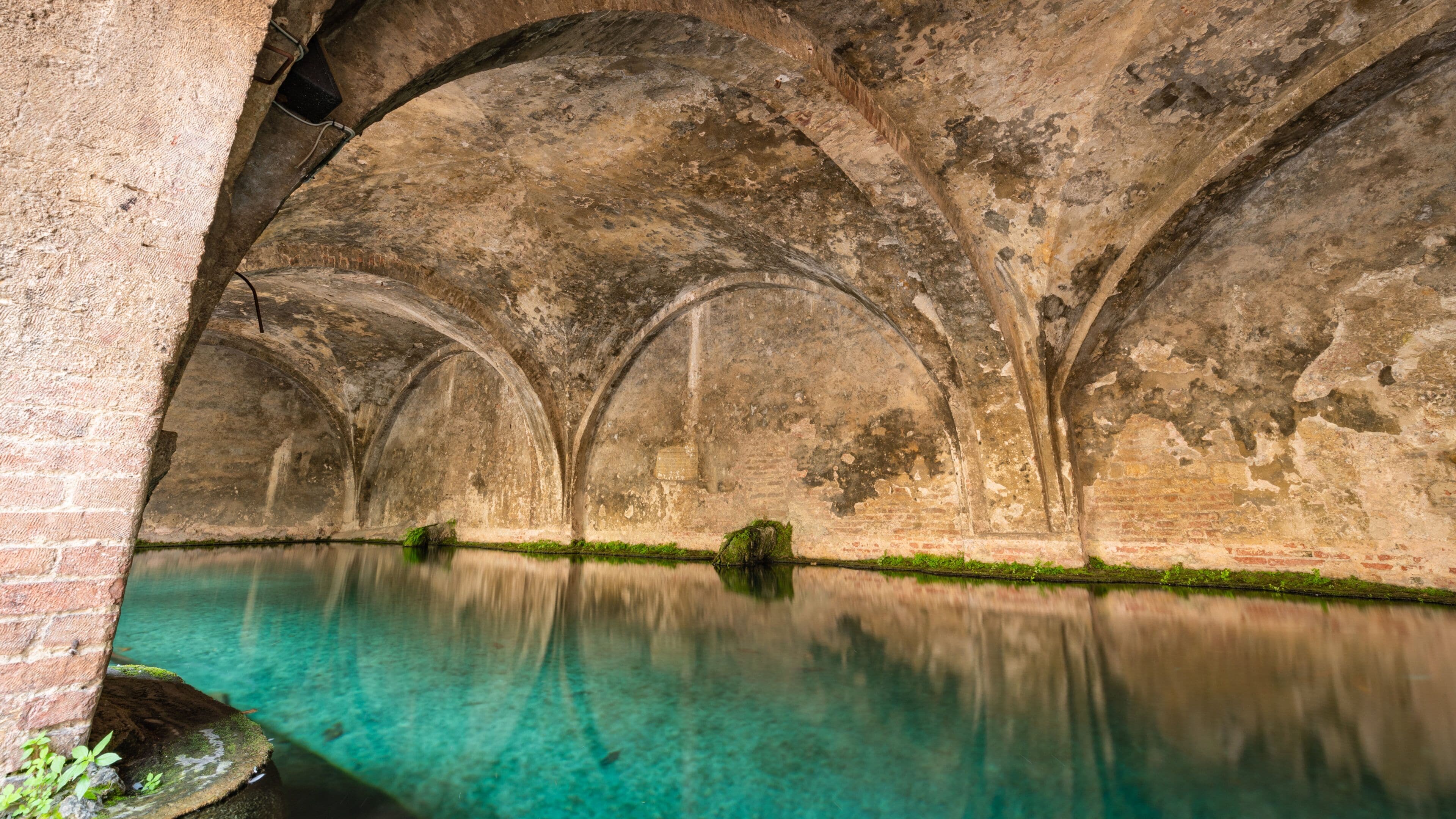 Fontebranda which includes heritage elements, a pool and interior views