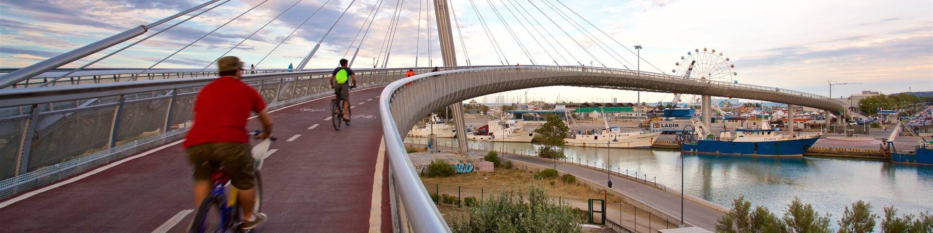 Ponte del Mare which includes a bridge, a sunset and cycling
