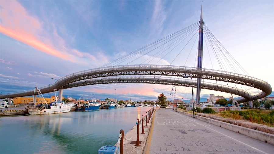 Ponte del Mare showing a sunset, a river or creek and a bridge