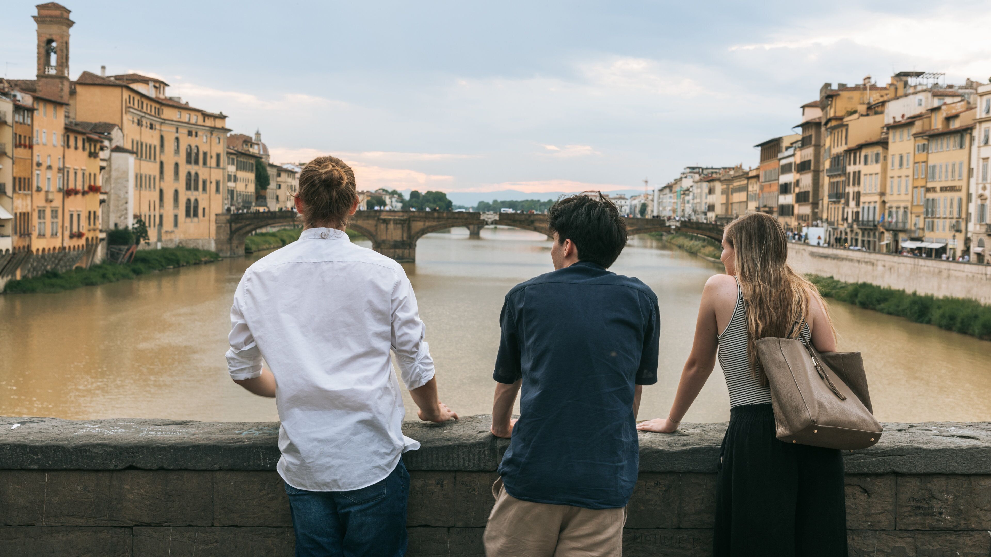 Arno River featuring a river or creek and views as well as a small group of people