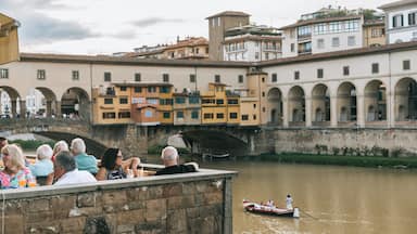 Arno River featuring kayaking or canoeing, a bridge and a river or creek