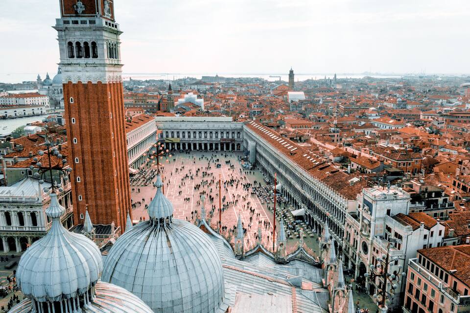 Piazza San Marco in Venice, featuring the Doge's Palace, St. Mark's Basilica, and the Campanile di San Marco.