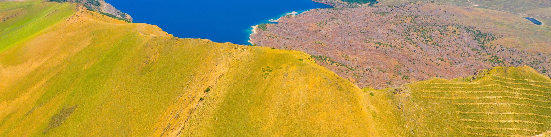 Lake Nemrut is a freshwater crater lake in Bitlis Province, eastern Turkey. It is part of Nemrut Caldera, a volcanic caldera atop Volcano Nemrut.