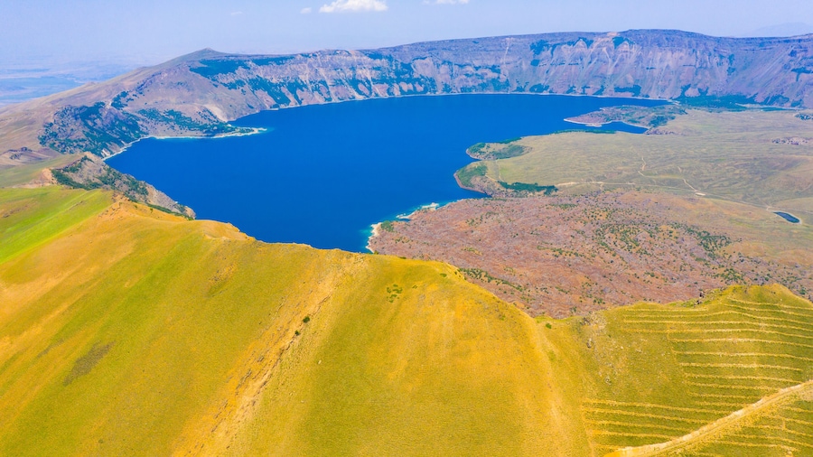 Lake Nemrut is a freshwater crater lake in Bitlis Province, eastern Turkey. It is part of Nemrut Caldera, a volcanic caldera atop Volcano Nemrut.
