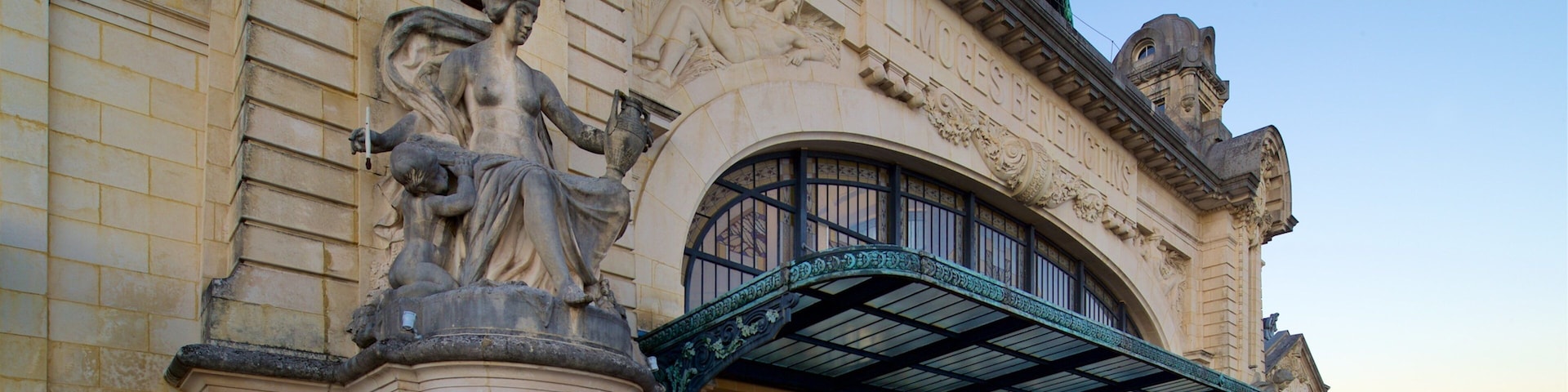 Gare de Limoges which includes a statue or sculpture, a sunset and heritage architecture