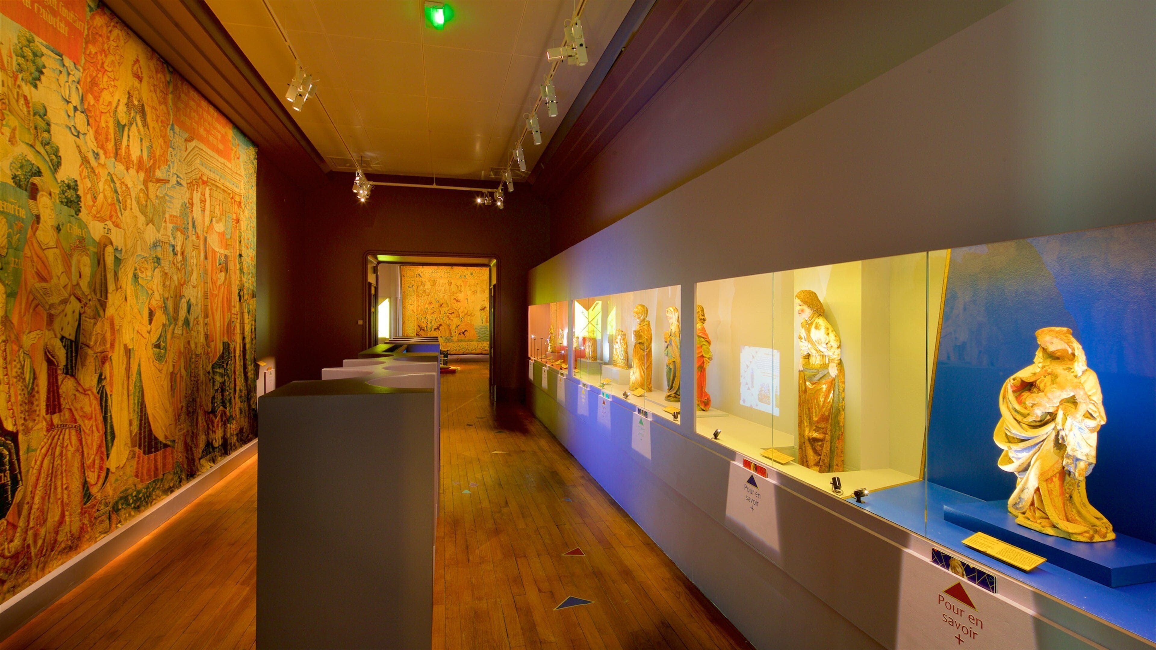 Musée Anne de Beaujeu featuring art and interior views