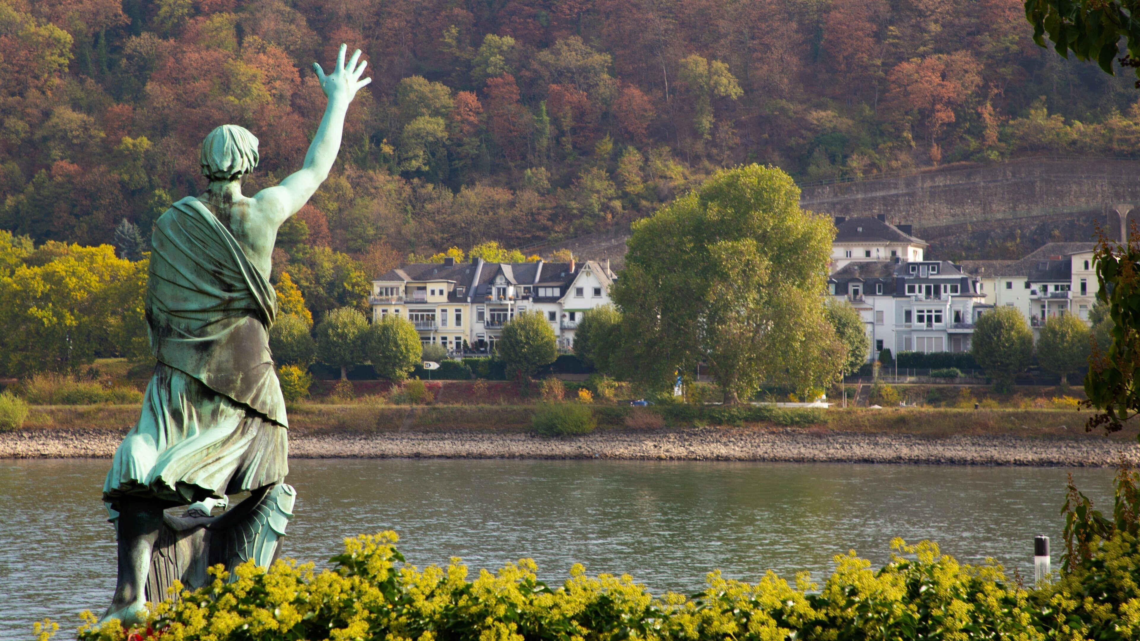 Altstadt Koblenz featuring a river or creek, heritage elements and a statue or sculpture