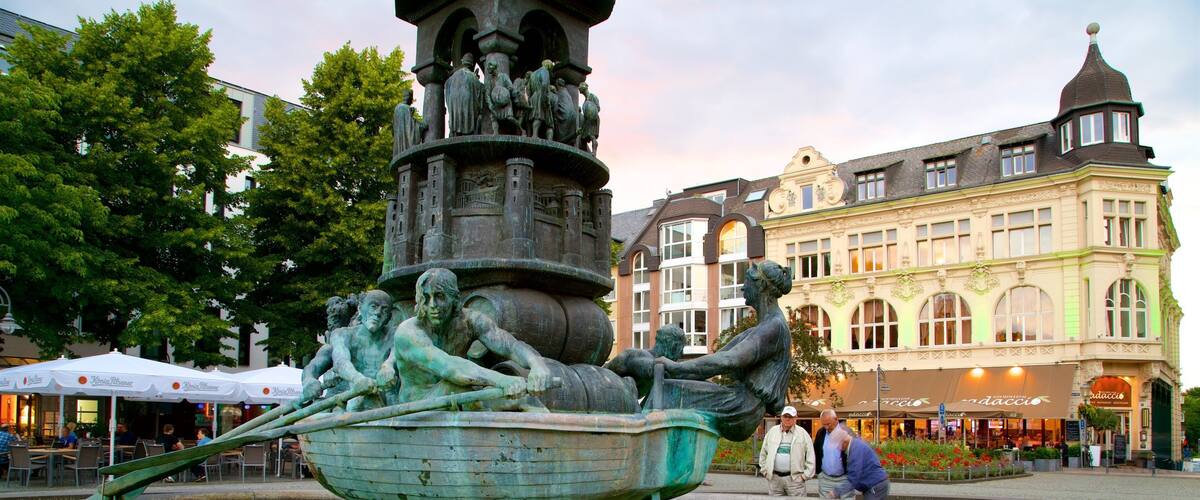 Altstadt featuring a statue or sculpture and a fountain