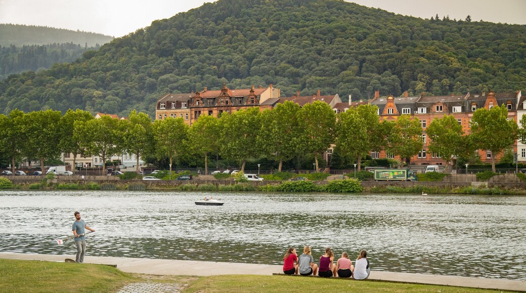 Leinpfad showing a river or creek and a park as well as a small group of people
