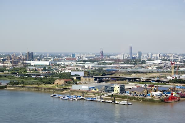 Aerial view of Newham, East London. With Trinity Buoy Wharf at the front and the stadium at Stratford to the rear.