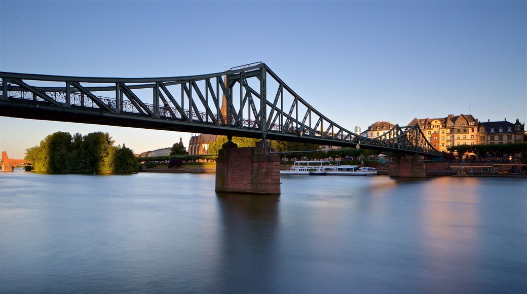 Eiserner Steg featuring a river or creek, a sunset and a bridge