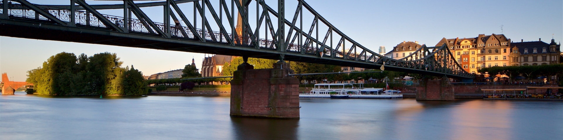 Eiserner Steg featuring a river or creek, a sunset and a bridge