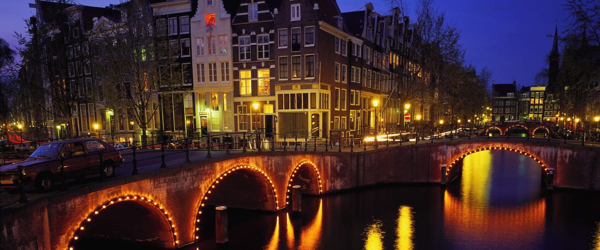 Illuminated Bridges Reflected in the Canals at Night, Keizersgracht, Amsterdam, Netherlands