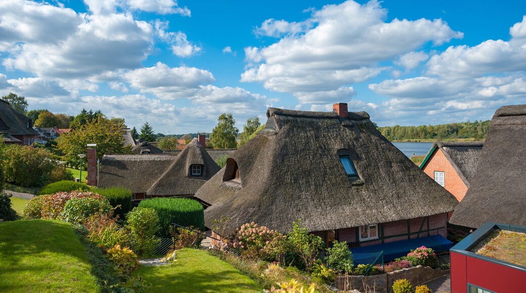 Fishing village Gothmund at the river Trave; Shutterstock ID 768786715