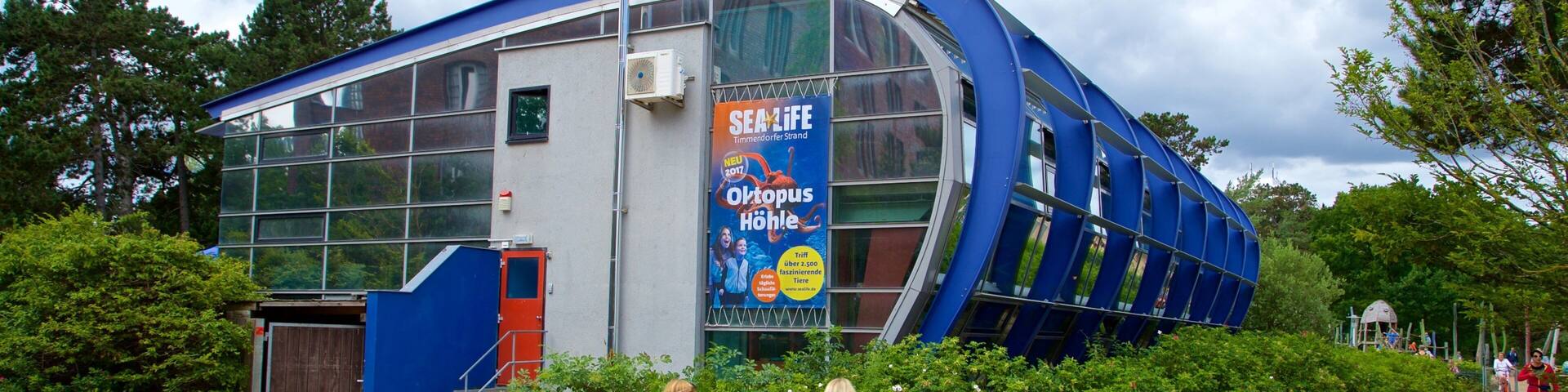 SEA LIFE Timmendorfer Strand which includes signage as well as a couple