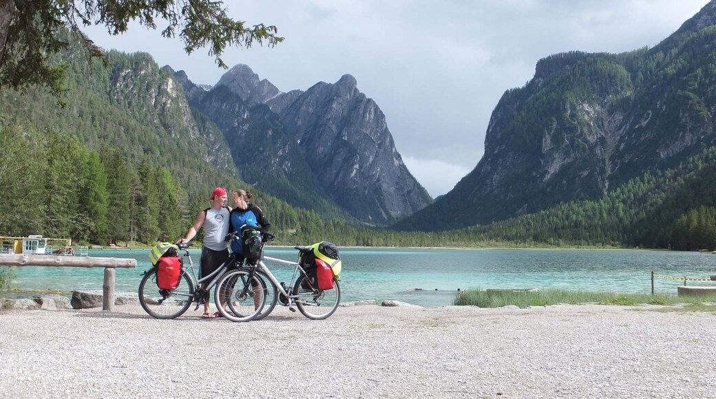 Sudtirol one of the most amazing place to travel on bicycle spend your summer surrounded by might dolomites clear lakes and romantic times while camping under the clear sky. These emotions will follow for along time