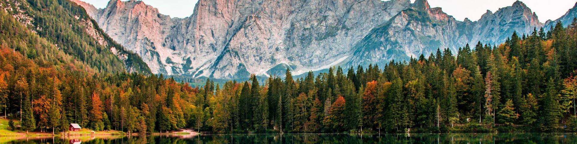 View over Mangart mountain at Laghi di Fusine lake, Friuli-Venezia Giulia, Italy