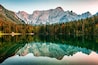 View over Mangart mountain at Laghi di Fusine lake, Friuli-Venezia Giulia, Italy