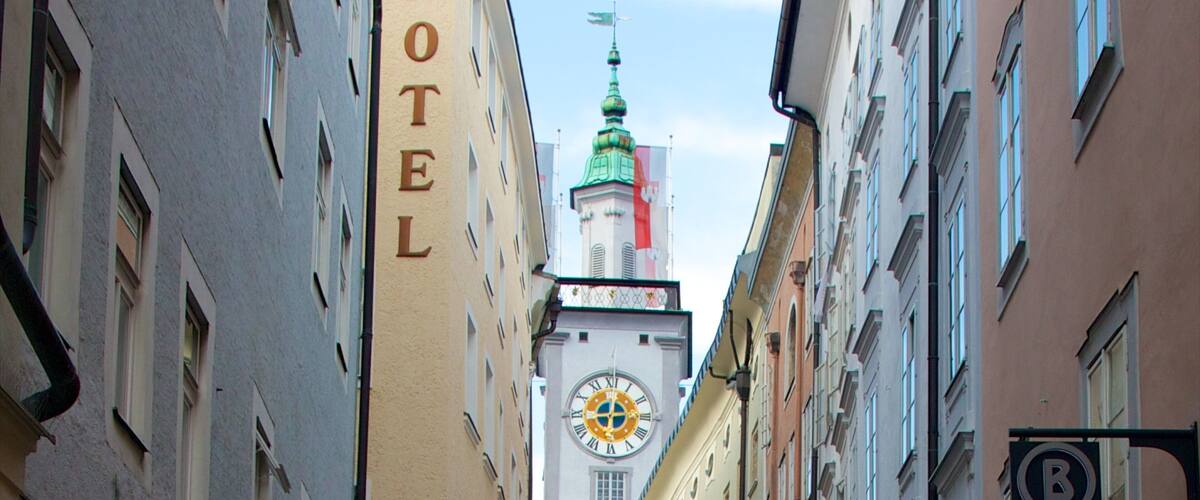 Salzburg showing heritage architecture, a hotel and signage