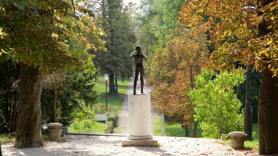 Ljubljana featuring fall colors, a park and a statue or sculpture