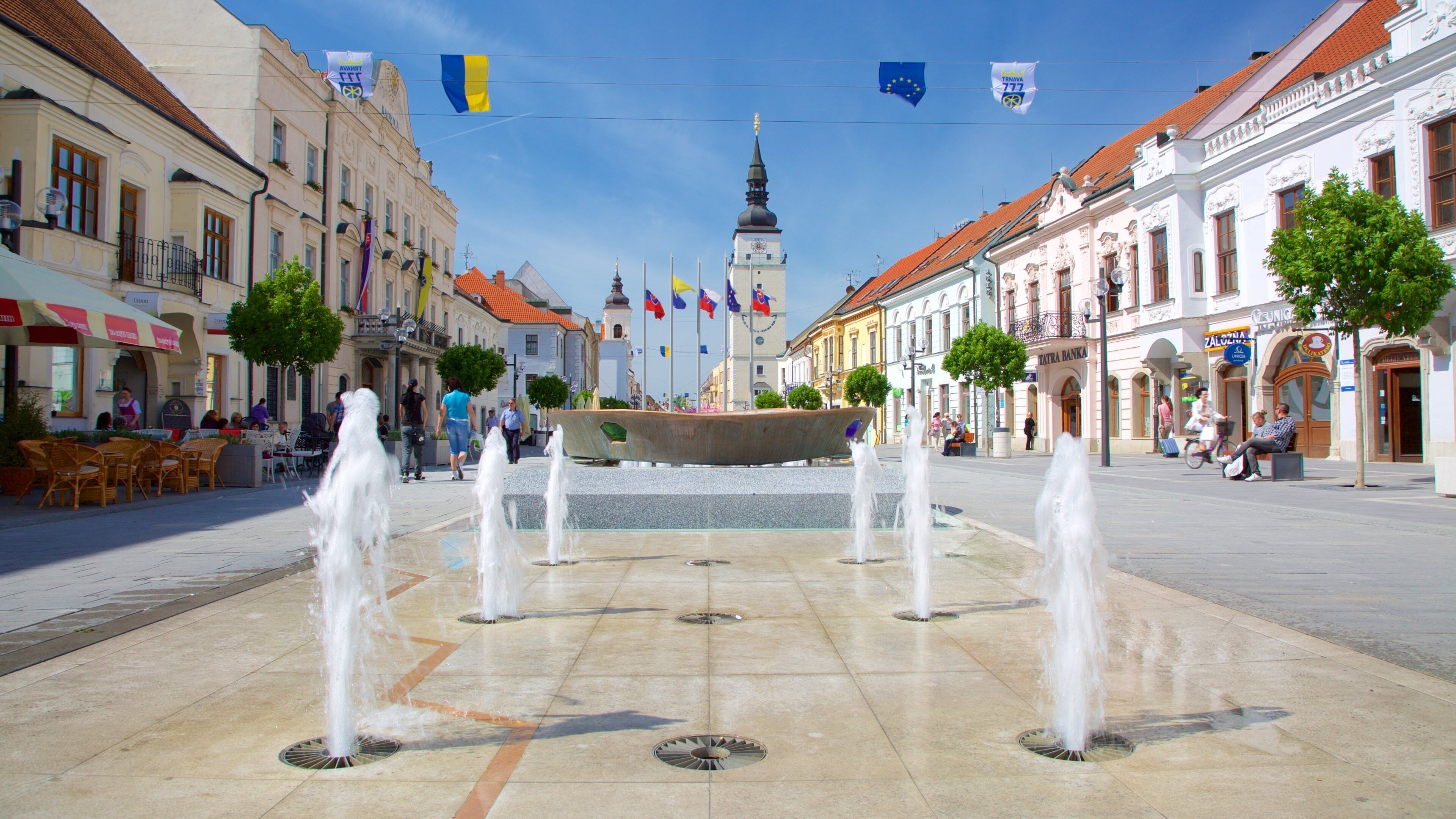 Trnava which includes a square or plaza, street scenes and a fountain
