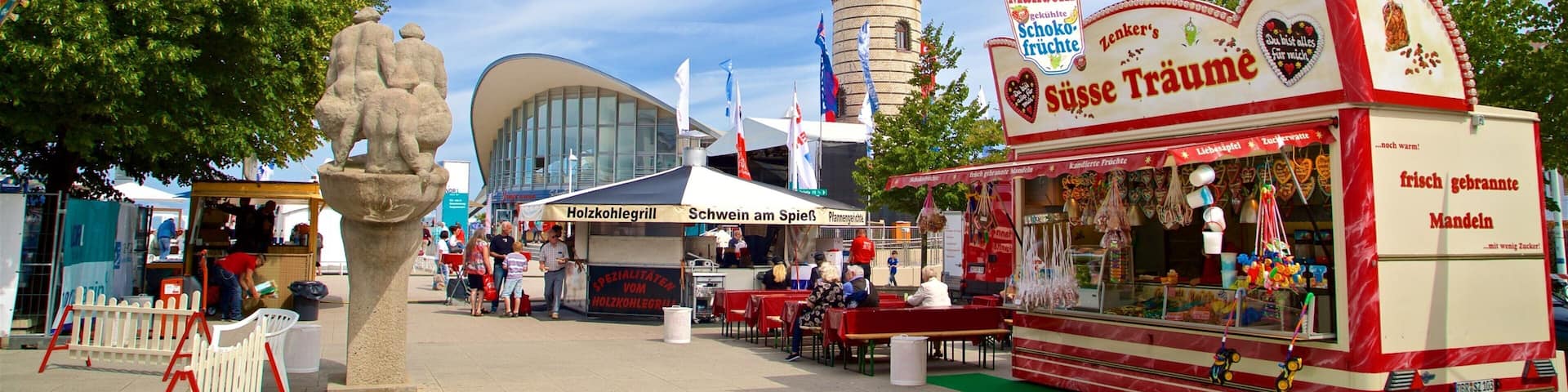 Warnemuende Lighthouse featuring markets and a lighthouse
