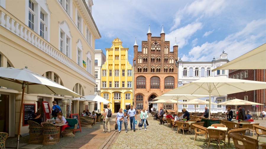 Wulflam House featuring heritage elements and street scenes as well as a family