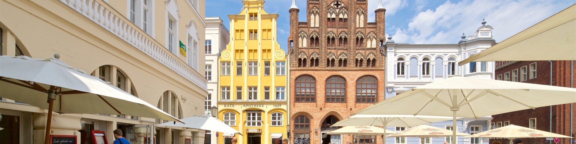 Wulflam House featuring heritage elements and street scenes as well as a family