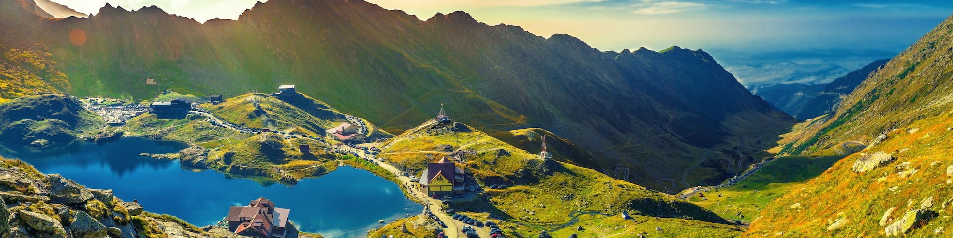 Transfagarasan Balea glacier lake, panoramic view - Lake, is a glacier lake situated at 2.034 m. of altitude in the Mountains, in central Romania, Sibiu County.