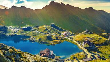 Transfagarasan Balea glacier lake, panoramic view - Lake, is a glacier lake situated at 2.034 m. of altitude in the Mountains, in central Romania, Sibiu County.